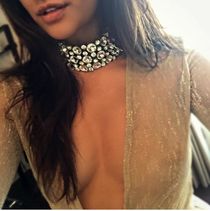 Busty Asian girl oils up